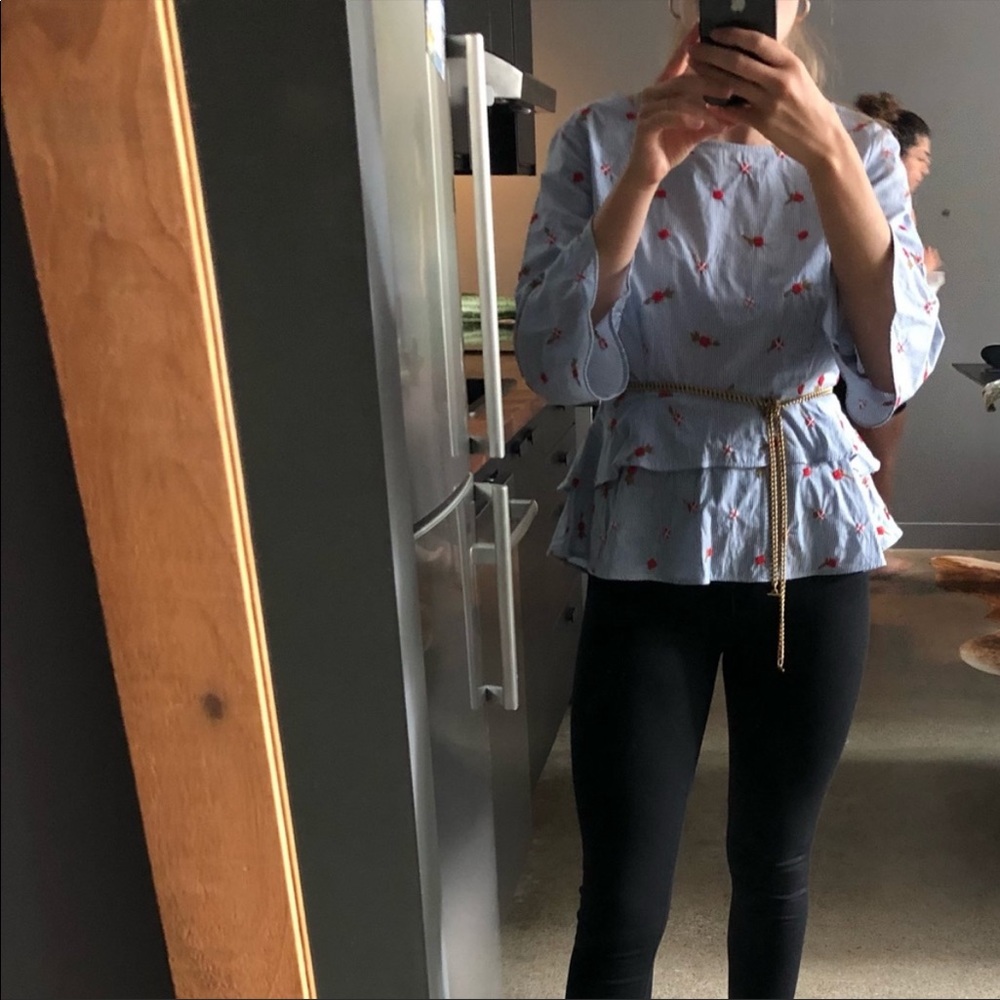 Blue pinstripe blouse with floral embroidered